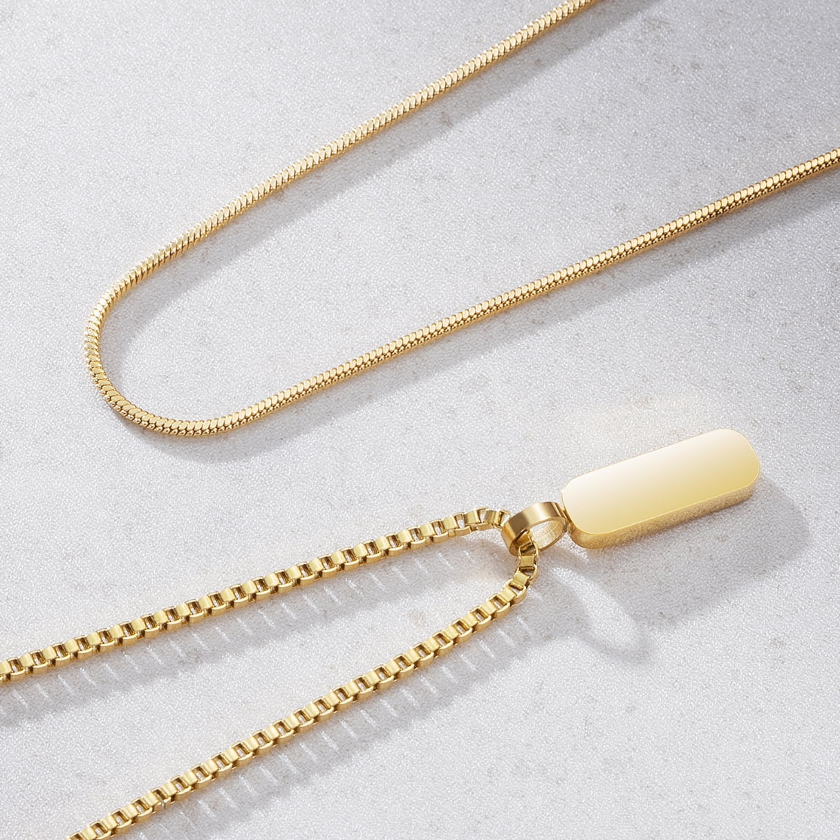 Apollo Pendant Necklace Duo gold on grey background