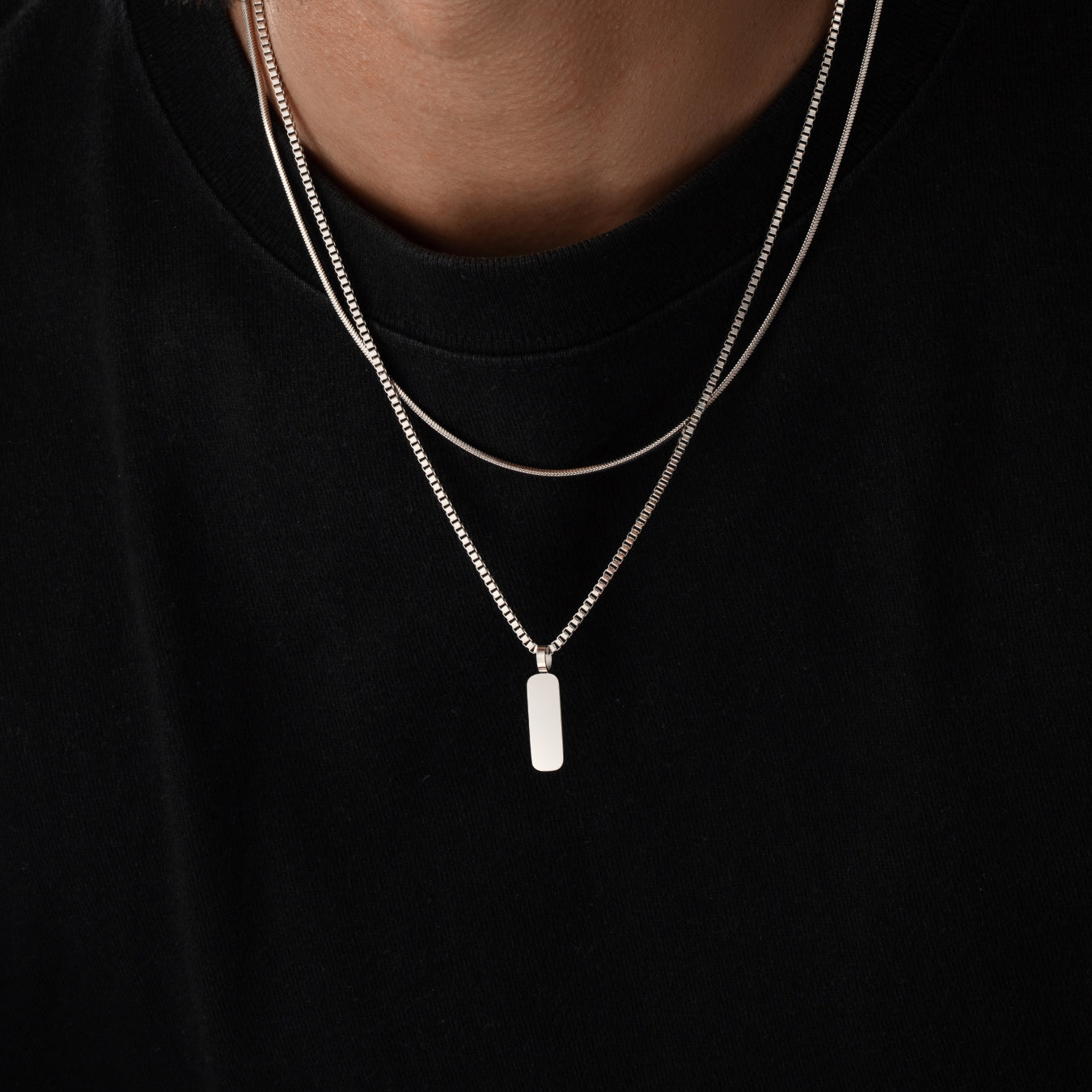 Apollo Pendant Necklace Duo silver close-up on shirt